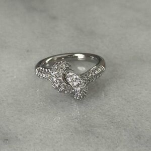 Silver Crystal Pave Knot Ring 

Brand New

Stainless Steel

Size 7